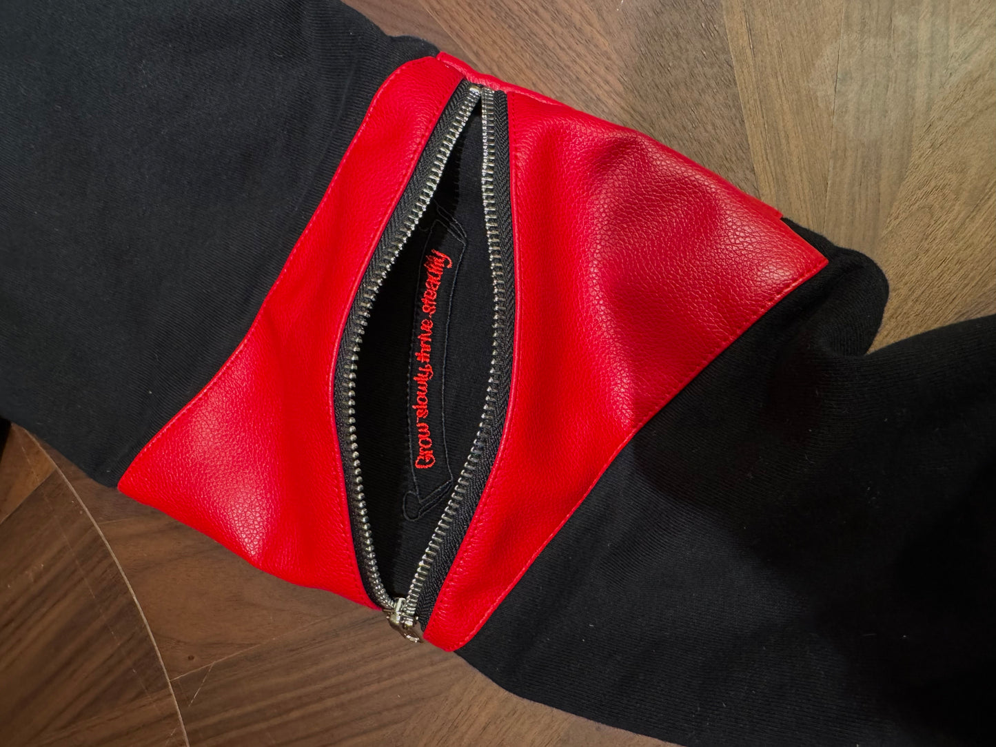 4EARLESS ‘splice’ Red spliced leather black coat